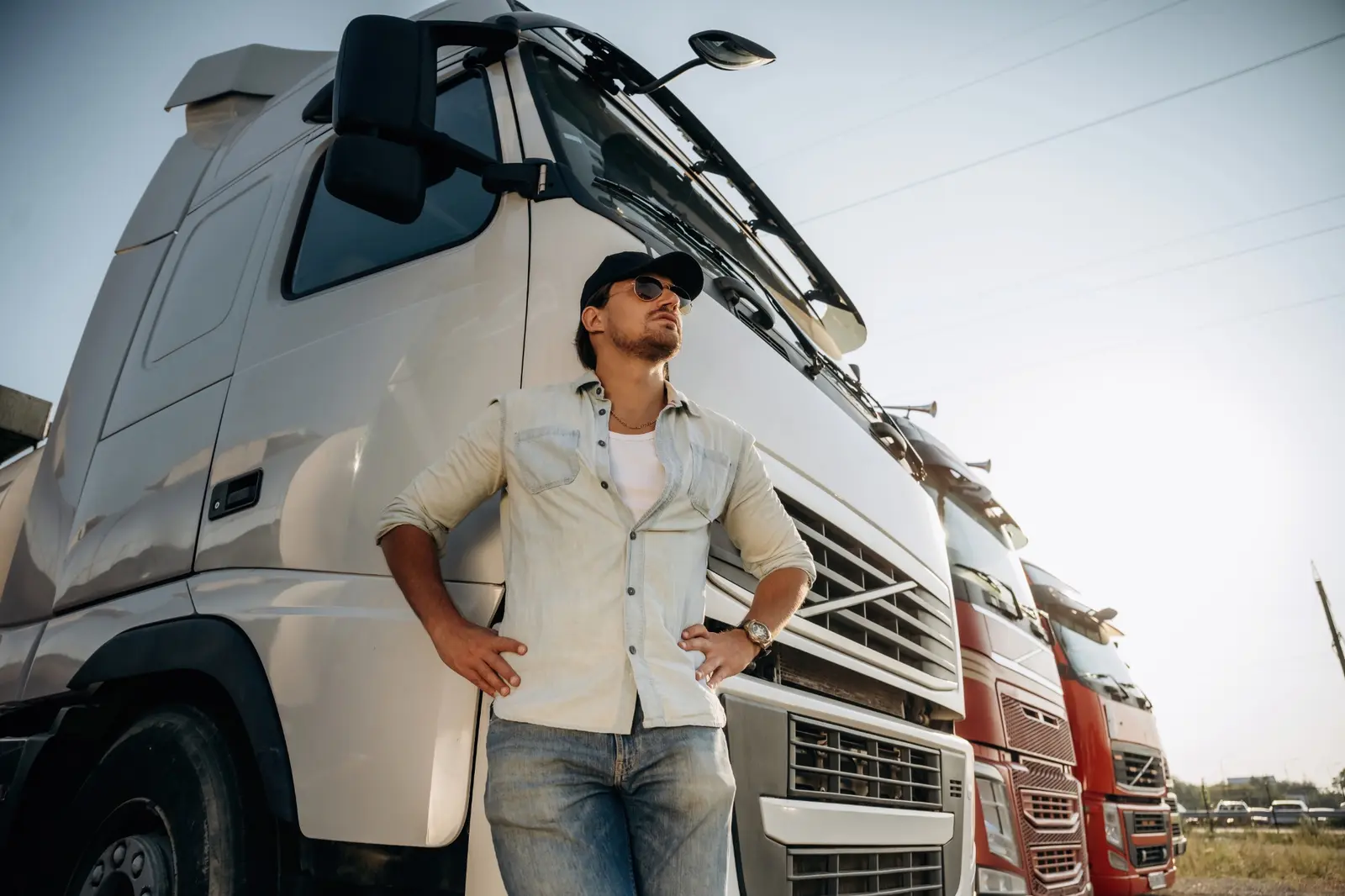 Vantins owner-operator truck insurance — driver standing beside a commercial semi truck